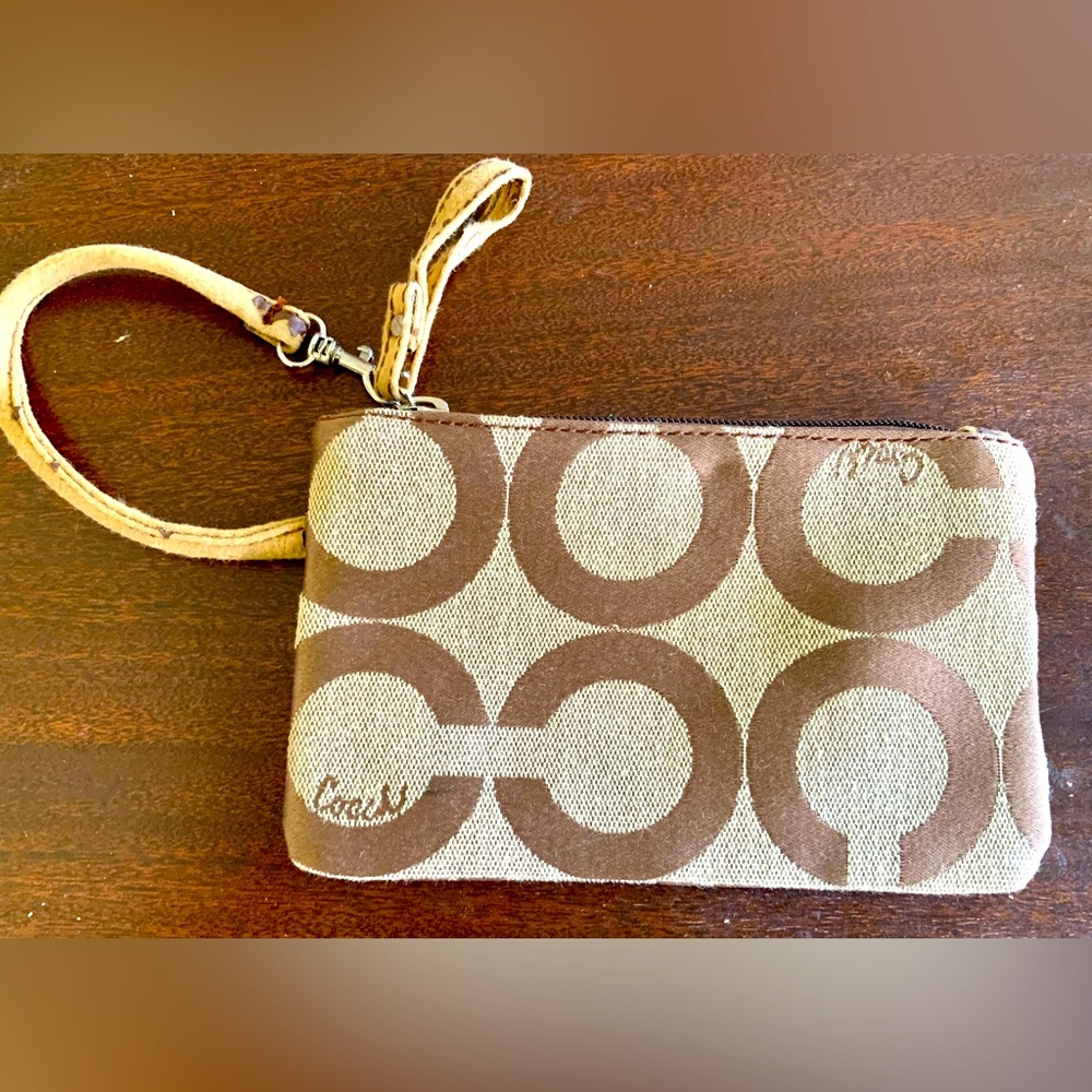 Coach wristlet in fair condition.